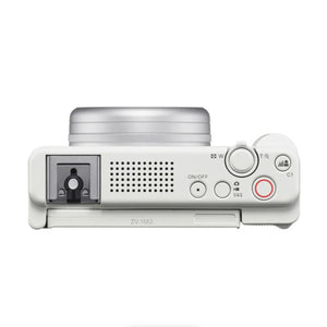 Sony ZV-1 II bianca vista dall'alto, con la griglia del microfono a tre capsule e la slitta multi-interfaccia
